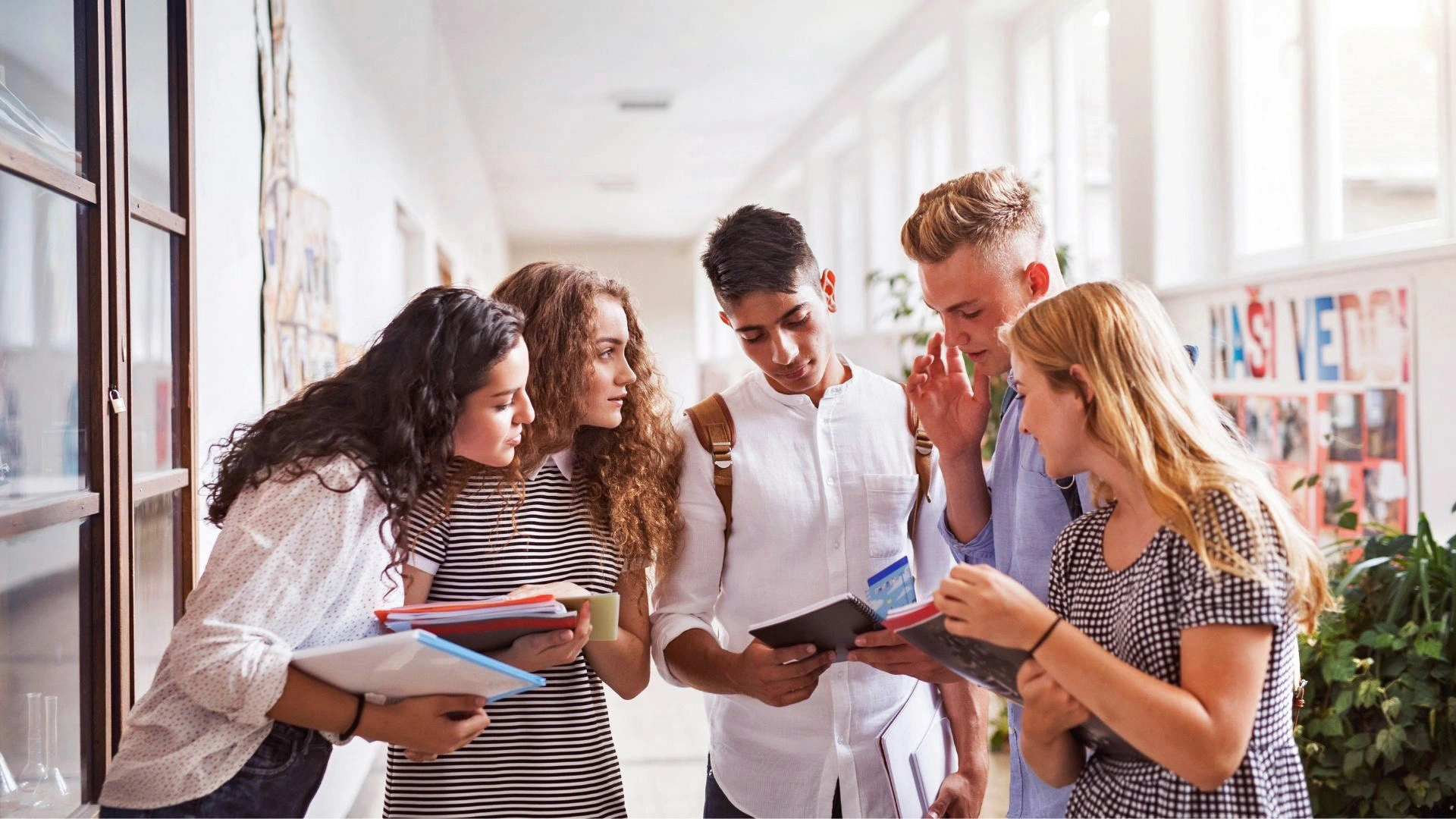 Picture of five younger patients in school who may have hyperhidrosis or need to self-catheterize.