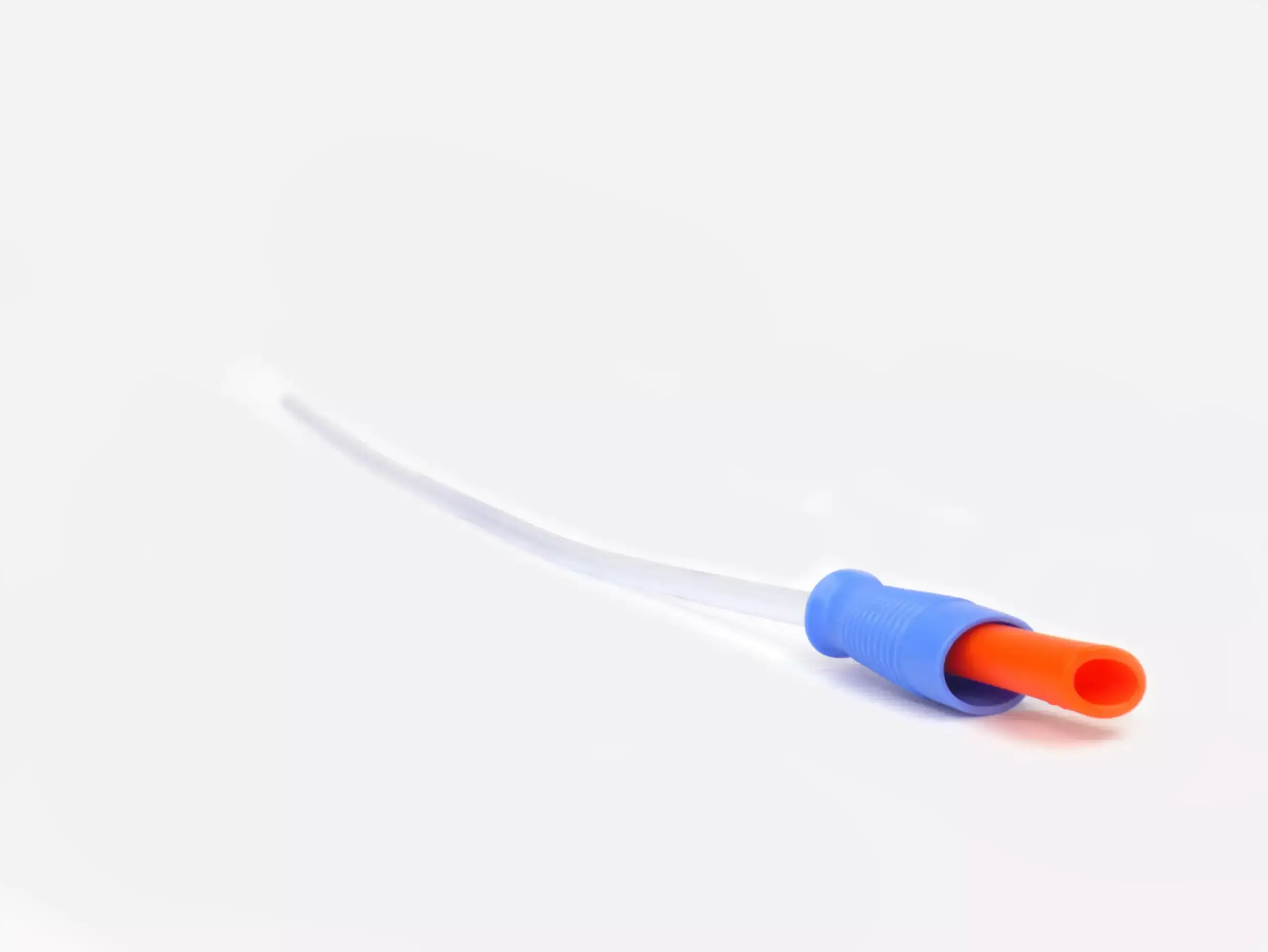 Photograph of a RA Fischer Co. Cure brand catheter with a blue and orange grip, set against a white background. [ Personalized urology care ]