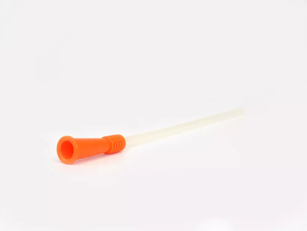 A photograph showcasing a Cure Catheter by RA Fischer Co., distinguished by its distinctive orange grip with a white background