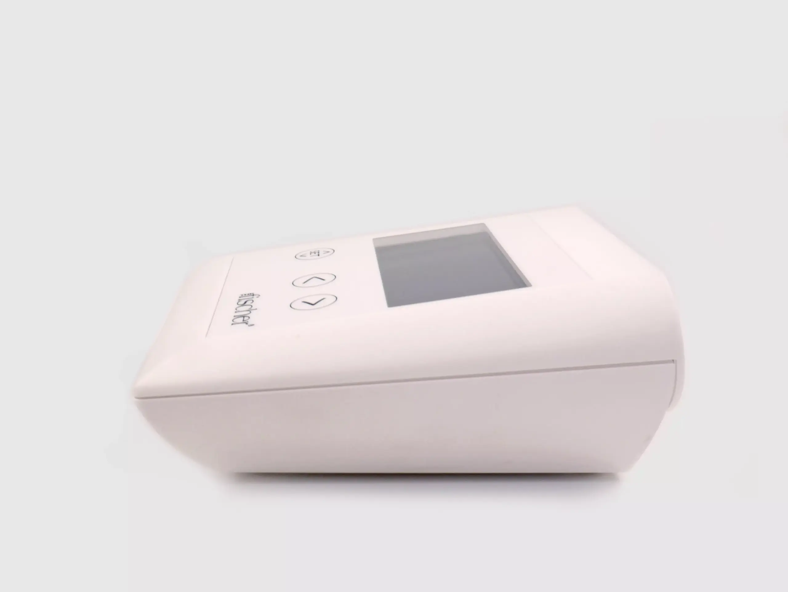 Side view photograph showcasing the white, rectangular 'main control unit' of RA Fischer's 'The Fischer' Device - an iontophoresis device meticulously tailored for hyperhidrosis (excessive sweating) treatment.. The image features a white background [ Iontophoresis Device for Sweating ]