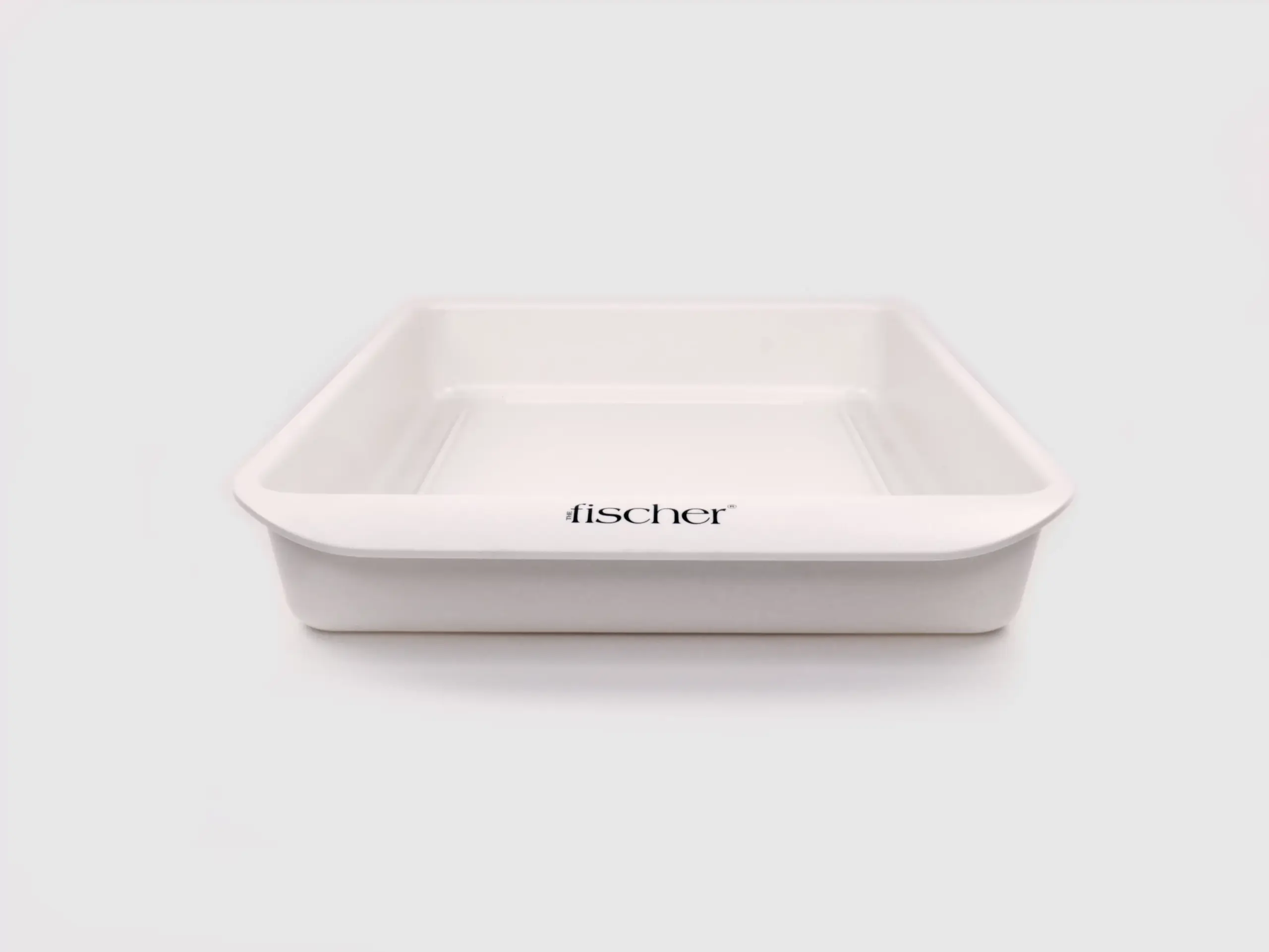 Photograph featuring one of the white water bath trays utilized in conjunction with RA Fischer's 'The Fischer' Device—an iontophoresis device crafted specifically for the treatment of hyperhidrosis (excessive sweating). The image is set against a plain white background.